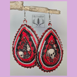 Handmade Crimson Rose and Skull Earrings with red roses, skull artwork, red rhinestone accents, Delica beadwork, and stainless steel hooks.